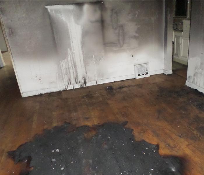 a picture of a fire and soot damage