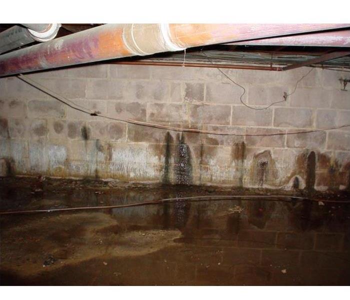 a picture of a basement with standing water